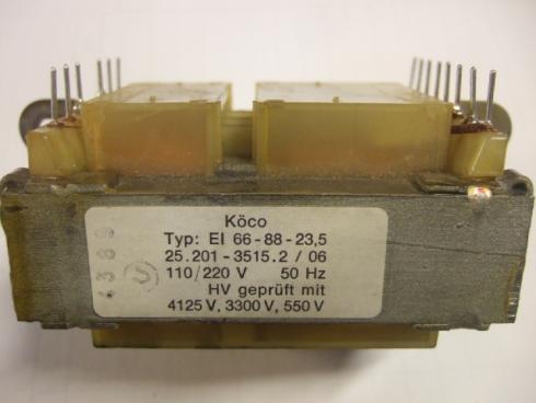 Pakka/piirilevymuuntaja ( kiinnityslaipoilla ). Nimellisarvot: 220/ 18V-2A, 8V-3A, 250V-200mA.  - Tuotekuva
